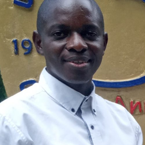 Image of a Tanzanian man with a golden background